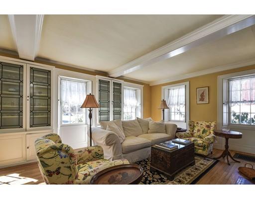72 Main Street Framingham, MA 01702 - Photo 6 of 28 a living room with furniture and a large window