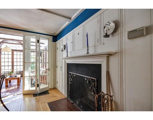 72 Main Street Framingham, MA 01702 - Photo 10 of 28 a picture of a living room with a fireplace