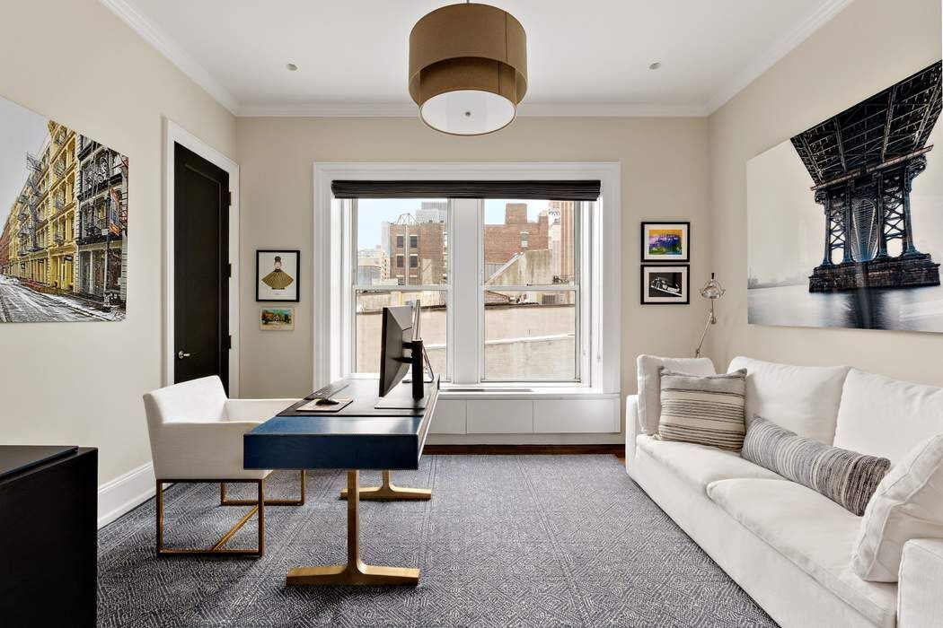 458 Broadway, Unit 6 Manhattan, NY 10013 - Photo 11 of 18 a living room with furniture and a large window