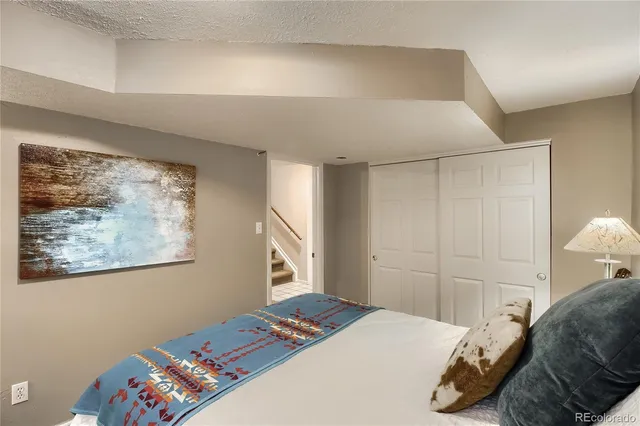 a bathroom with a shower sink and mirror