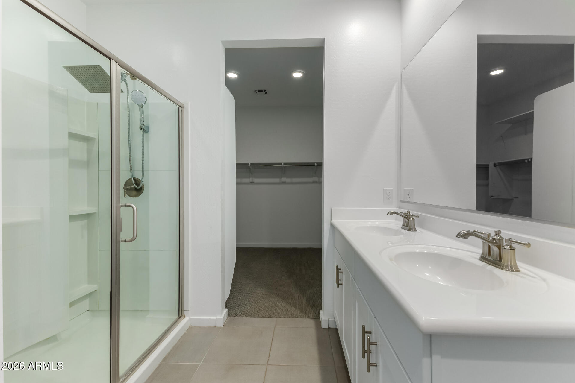 4337 East Italian Trotter Road San Tan Valley, AZ 85140 - Photo 20 of 35 a bathroom with a double vanity sink mirror and shower