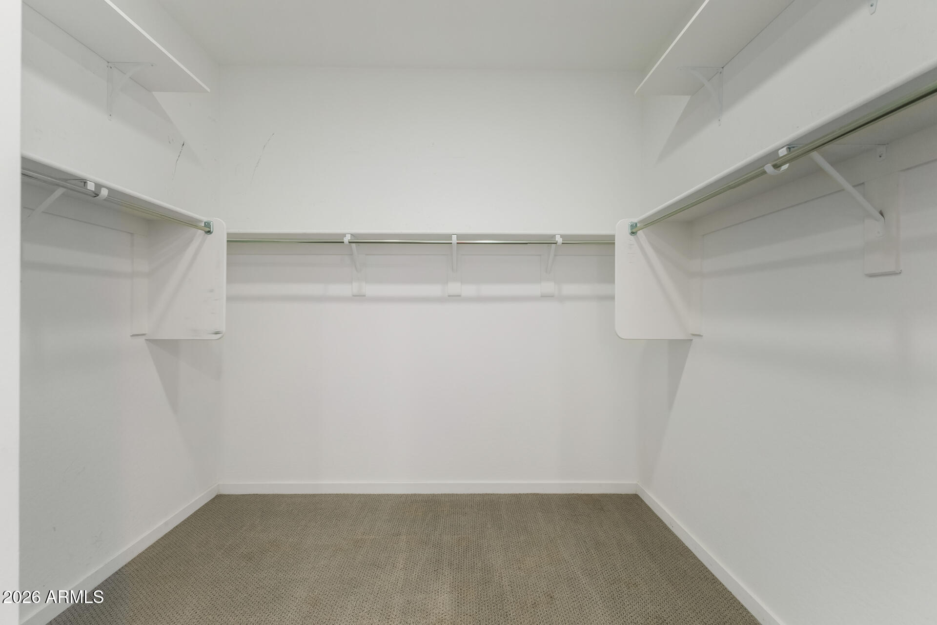 4337 East Italian Trotter Road San Tan Valley, AZ 85140 - Photo 22 of 35 a view of an empty walk in closet