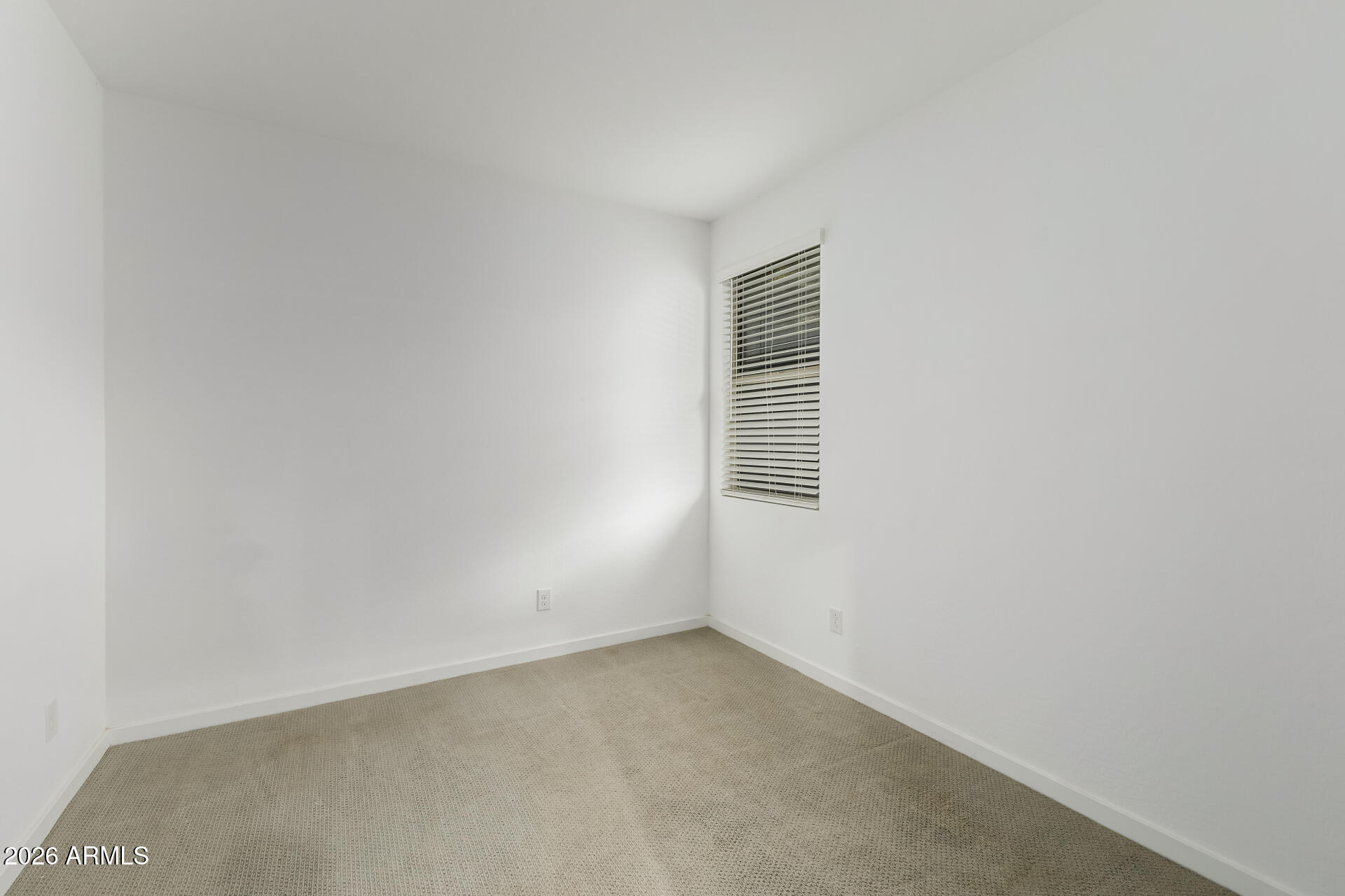 4337 East Italian Trotter Road San Tan Valley, AZ 85140 - Photo 23 of 35 a view of an empty room and a window