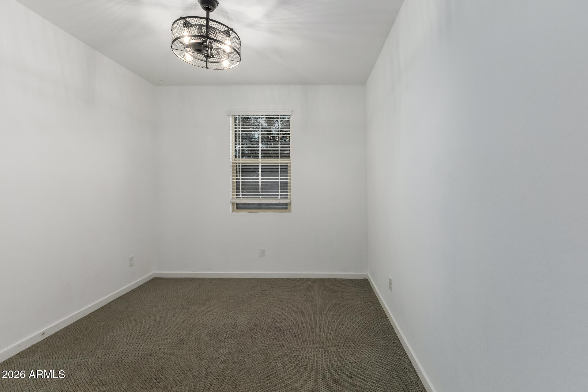 4337 East Italian Trotter Road San Tan Valley, AZ 85140 - Photo 26 of 35 an empty room with a window