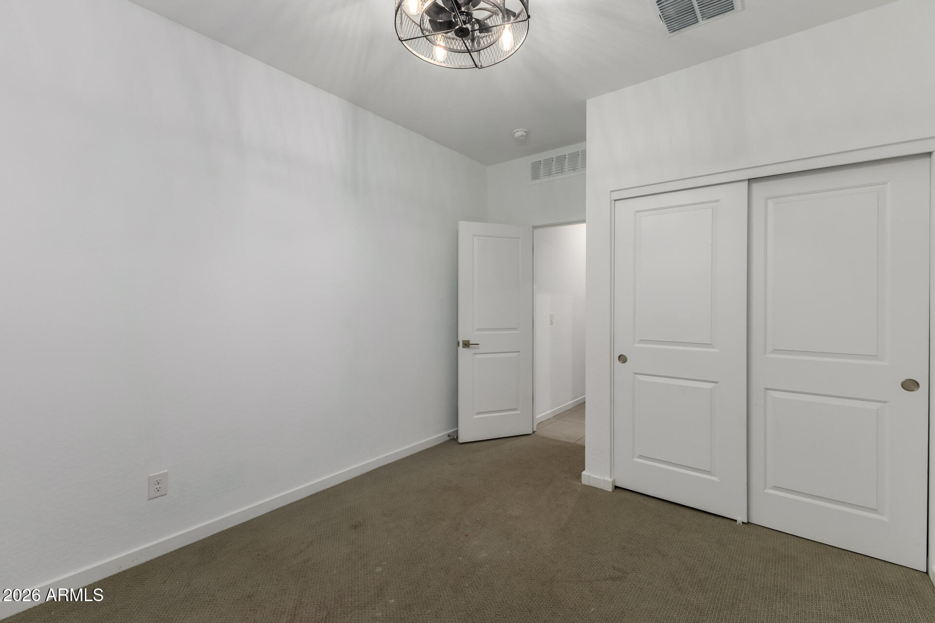 4337 East Italian Trotter Road San Tan Valley, AZ 85140 - Photo 27 of 35 wooden floor in an empty room