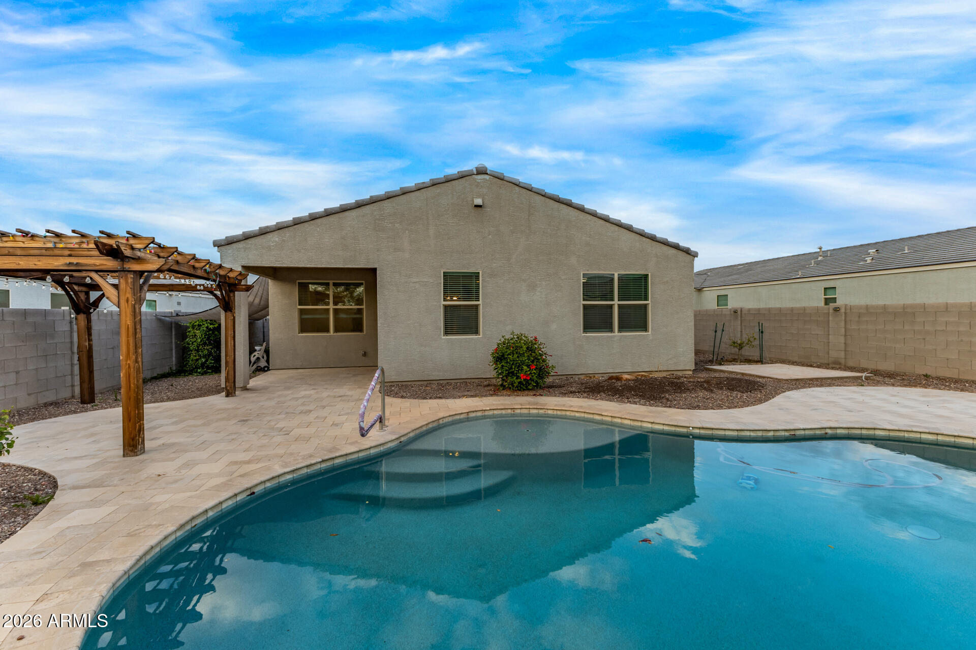 4337 East Italian Trotter Road San Tan Valley, AZ 85140 - Photo 31 of 35 a house view with swimming pool in front of it