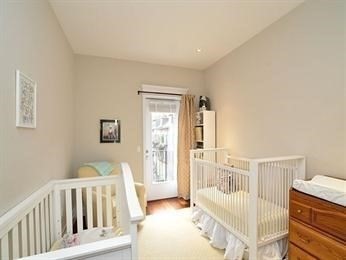 684 Tremont Street, Unit 5 Boston, MA 02118 - Photo 9 of 10 a bedroom with furniture and wooden floor