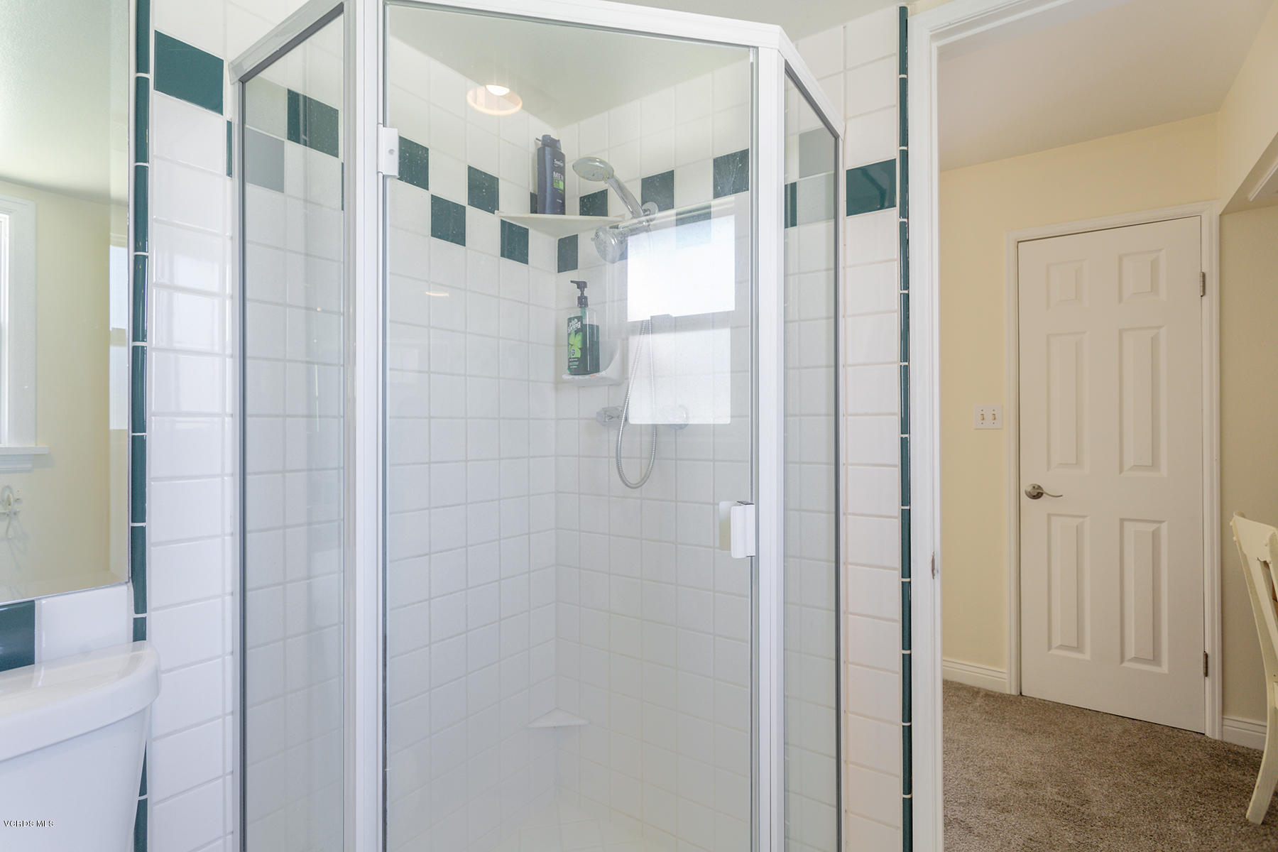 60 Marvin Court Simi Valley, CA 93065 - Photo 14 of 24 a bathroom with a glass shower door