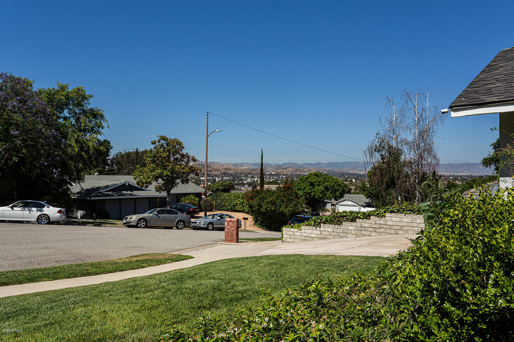 60 Marvin Court Simi Valley, CA 93065 - Photo 3 of 24 a view of swimming pool with outdoor seating and plants
