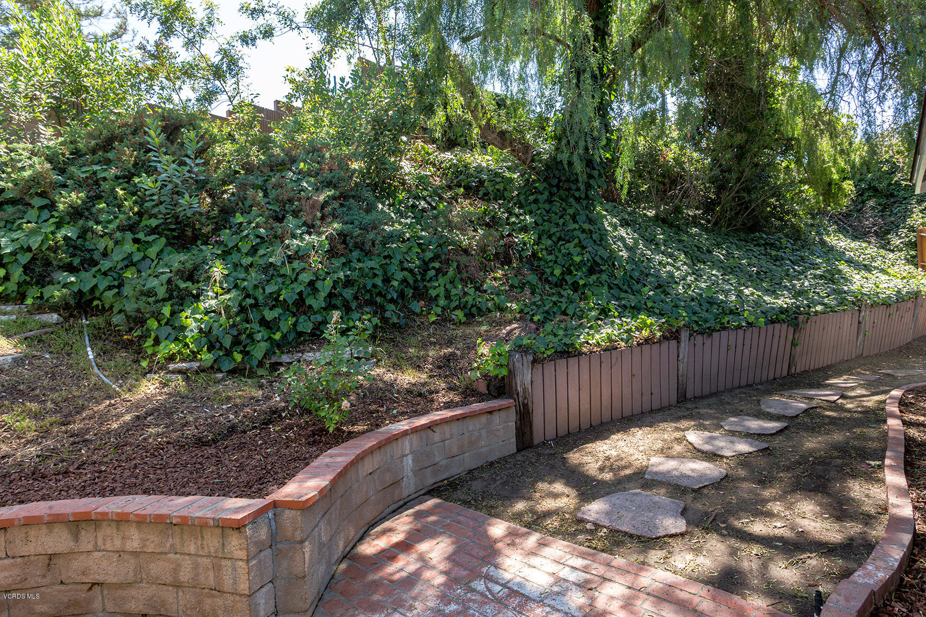 60 Marvin Court Simi Valley, CA 93065 - Photo 23 of 24 a view of a yard with wooden fence