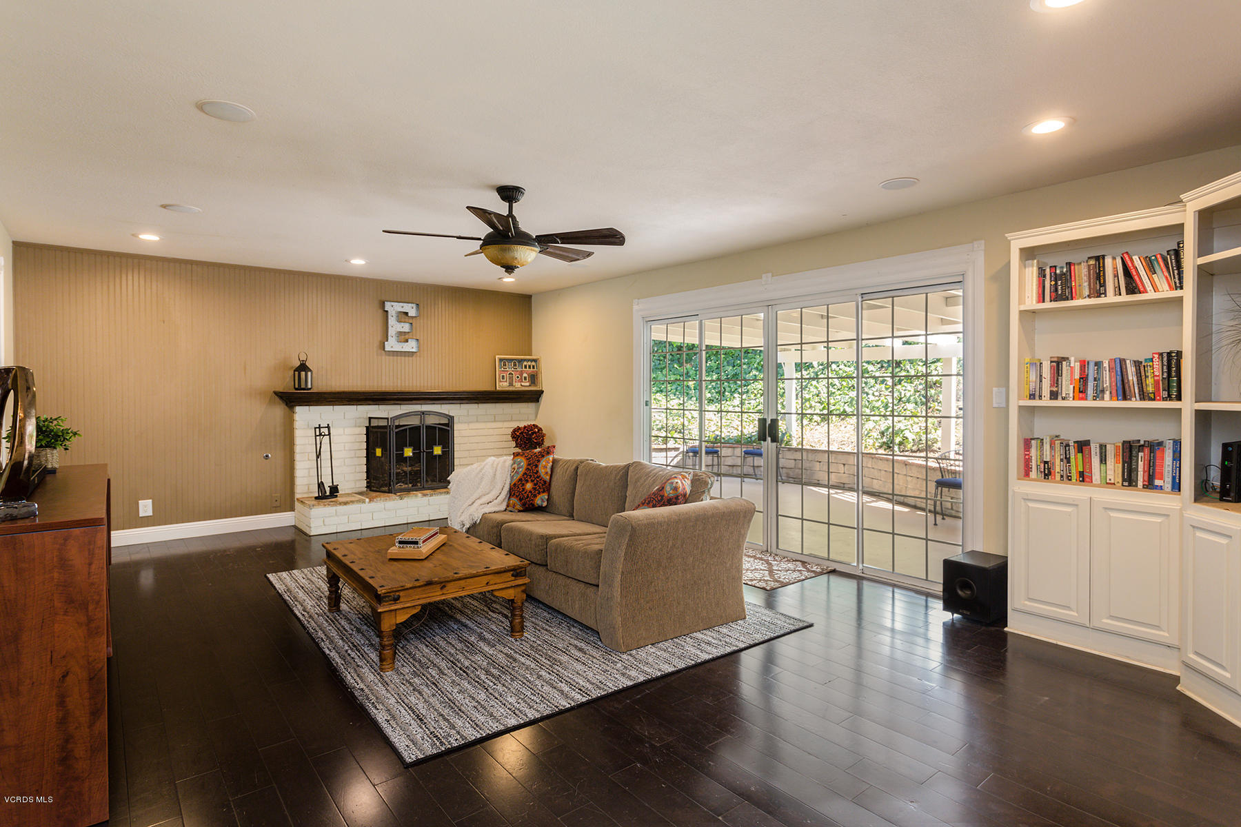 60 Marvin Court Simi Valley, CA 93065 - Photo 5 of 24 a living room with furniture and a fireplace