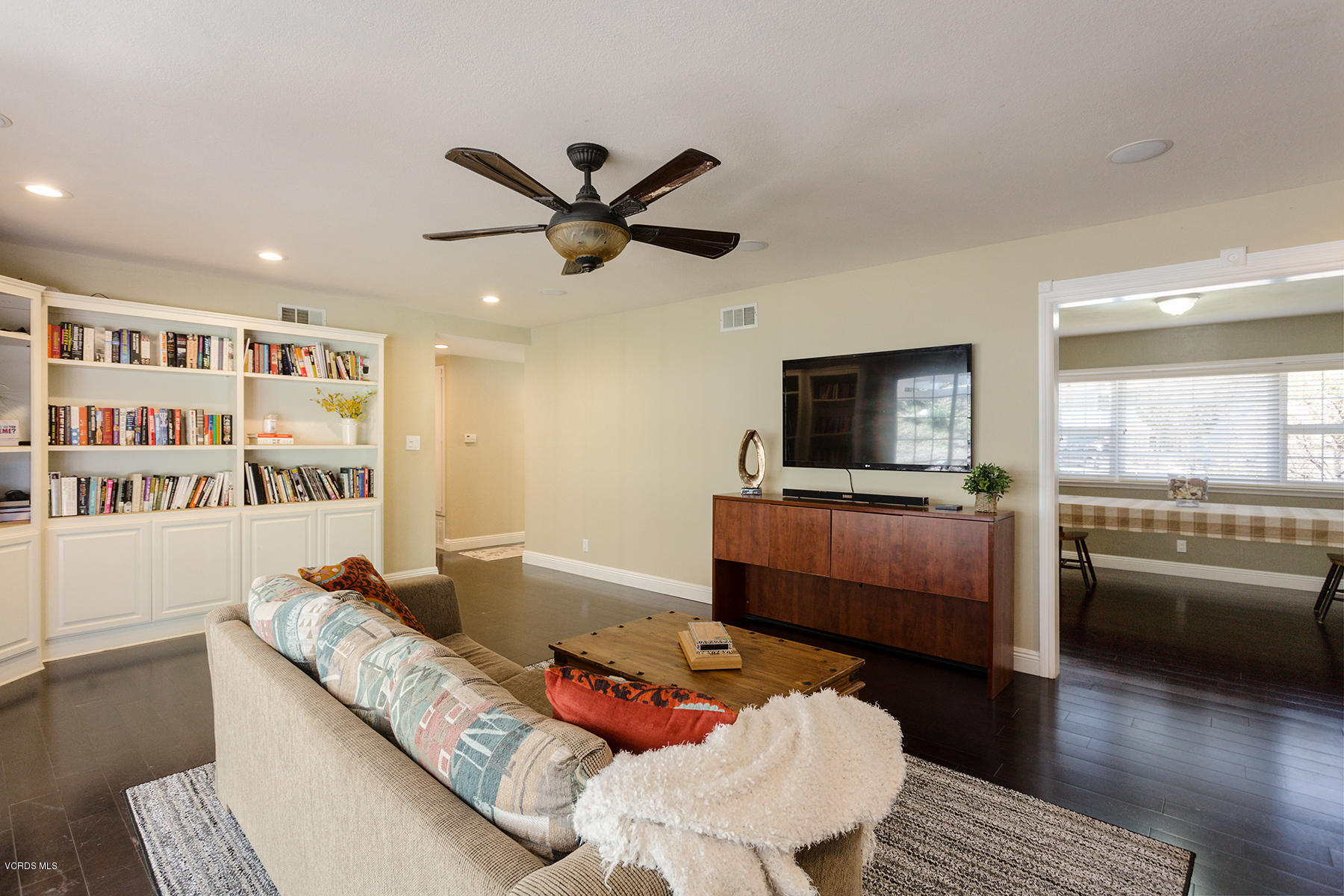 60 Marvin Court Simi Valley, CA 93065 - Photo 6 of 24 a living room with furniture and a flat screen tv