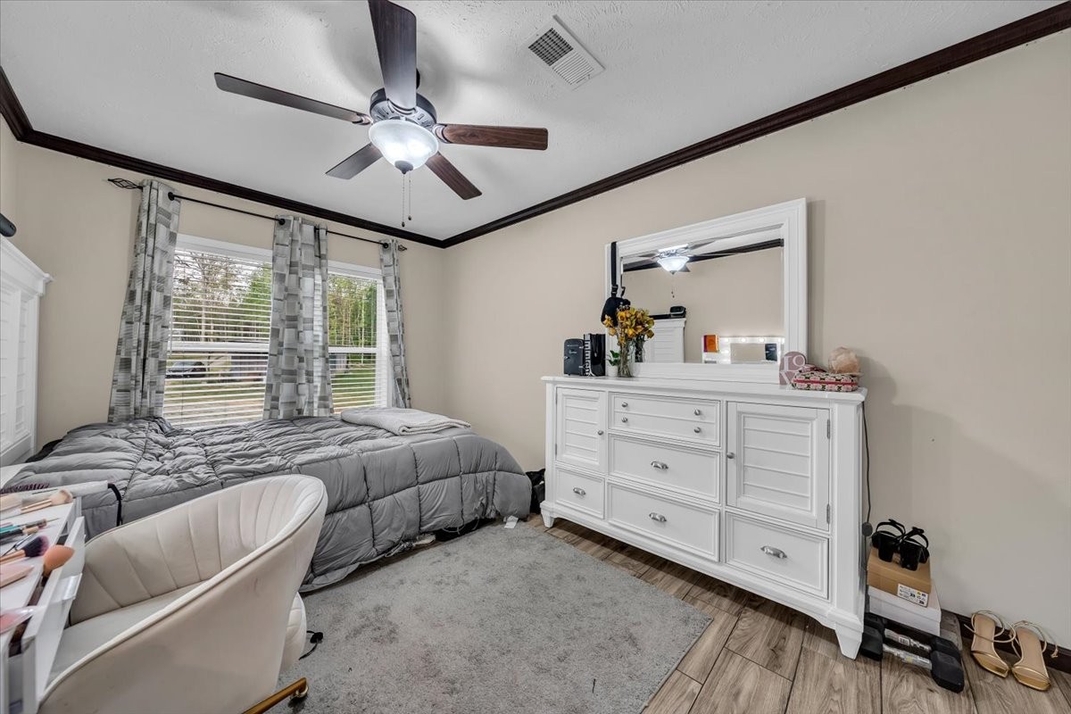 195 Roddy Springs Road Coalmont, TN 37313 - Photo 30 of 44 a bed room with bed and window