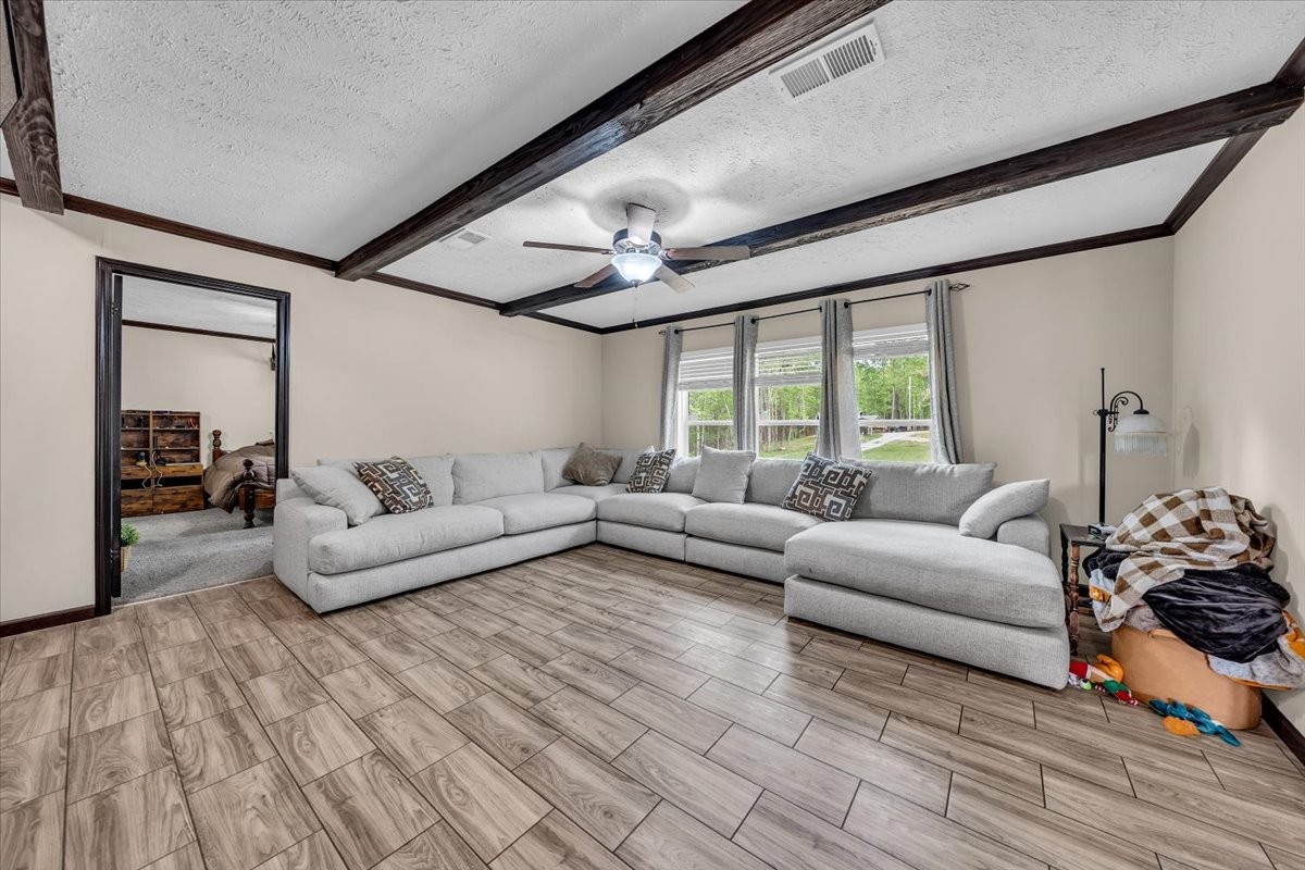 195 Roddy Springs Road Coalmont, TN 37313 - Photo 5 of 44 a living room with furniture and a large window