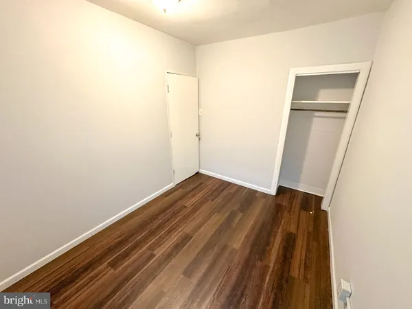 a view of small space with wooden floor
