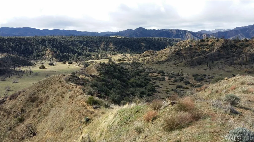3151 Castle Creek Road Alton, CA 84710 - Photo 15 of 23 a view of a town with mountains in the background