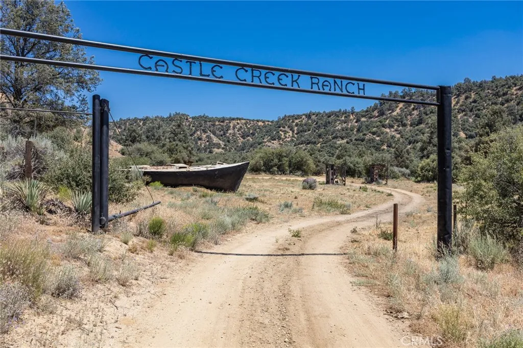 3151 Castle Creek Road Alton, CA 84710 - Photo 8 of 23 a view of a balcony with a table and chairs