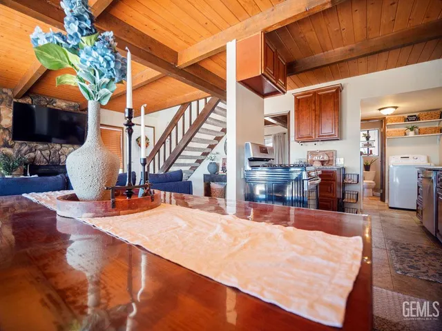 a view of living room with furniture and flat screen tv