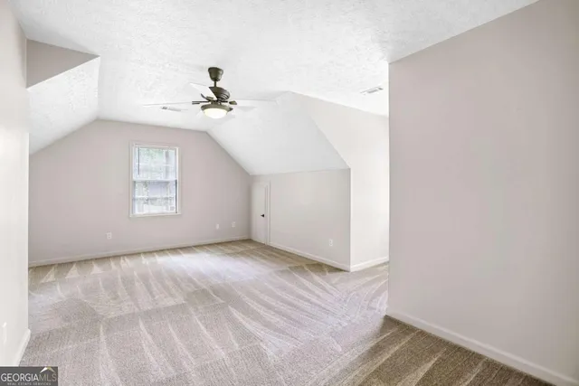 a balcony with trees in front of it