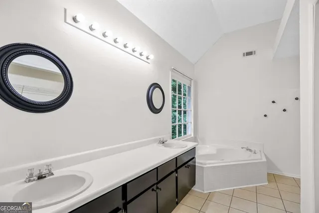 a house view with a backyard space