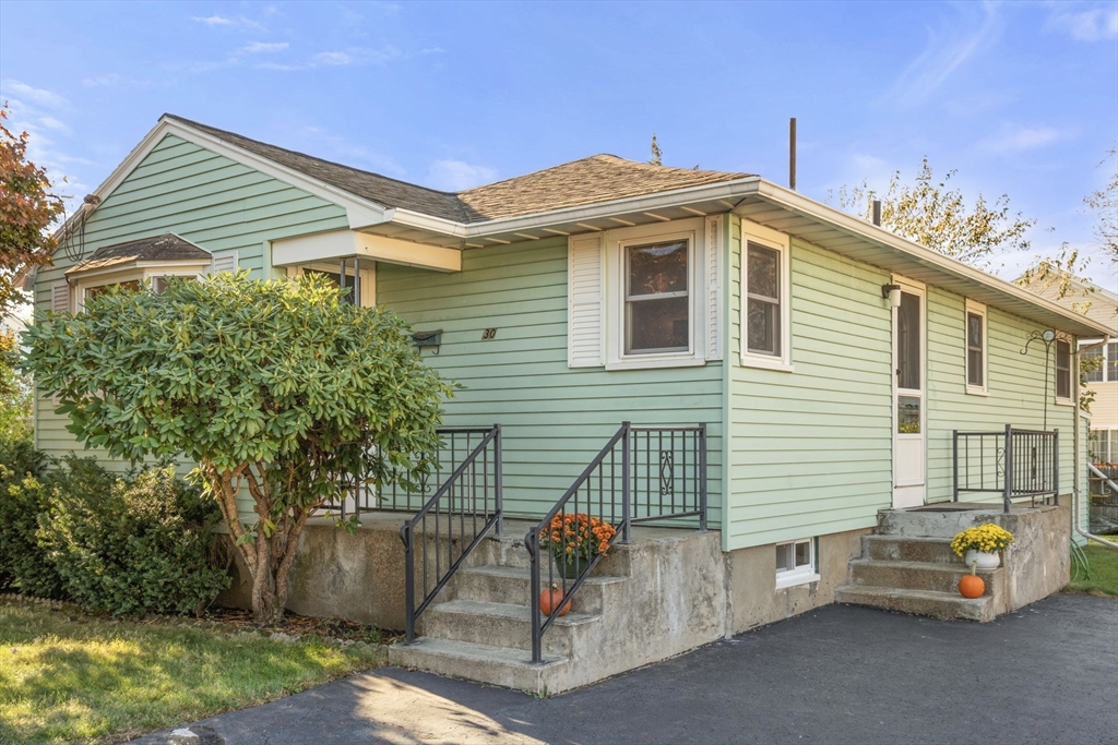 a view of outdoor space and front view of a house