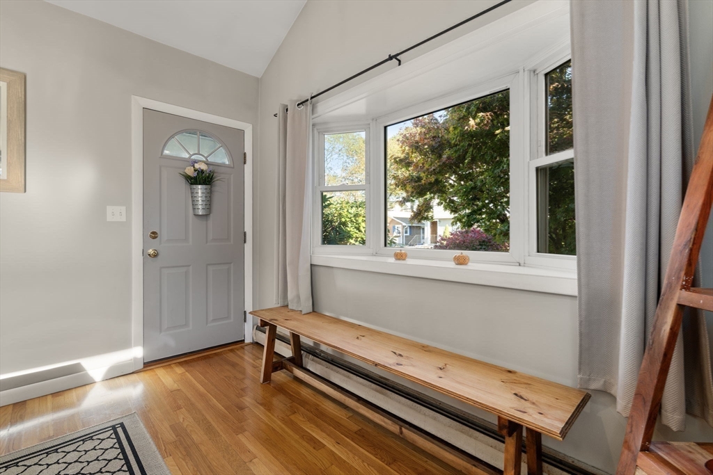 30 Wampum Avenue Waltham, MA 02451 - Photo 12 of 29 a view of room with window and wooden floor