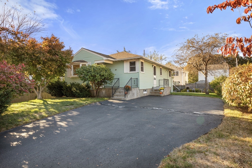 30 Wampum Avenue Waltham, MA 02451 - Photo 2 of 29 a view of a house with a yard