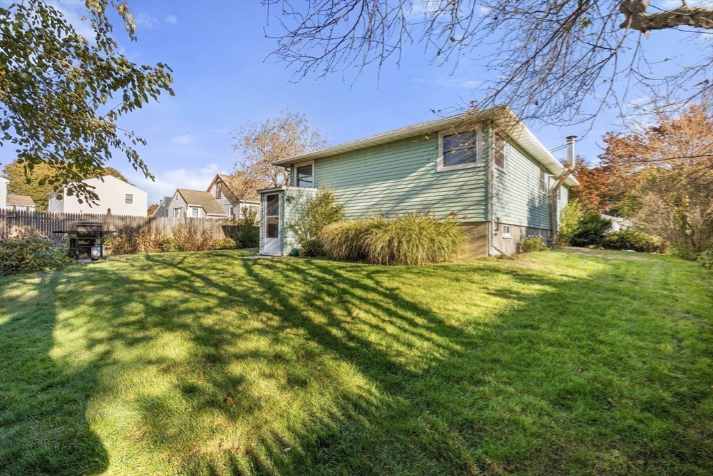 30 Wampum Avenue Waltham, MA 02451 - Photo 25 of 29 a view of back yard of the house