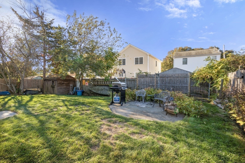 30 Wampum Avenue Waltham, MA 02451 - Photo 28 of 29 a view of a house with backyard and sitting area
