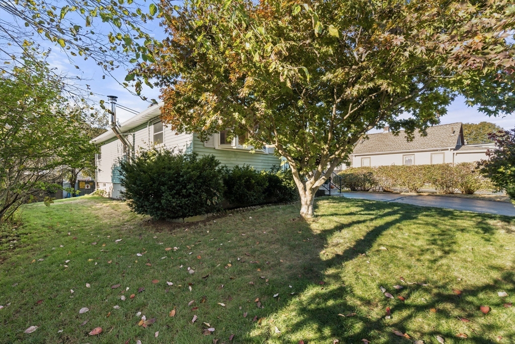 30 Wampum Avenue Waltham, MA 02451 - Photo 4 of 29 a view of swimming pool with a yard