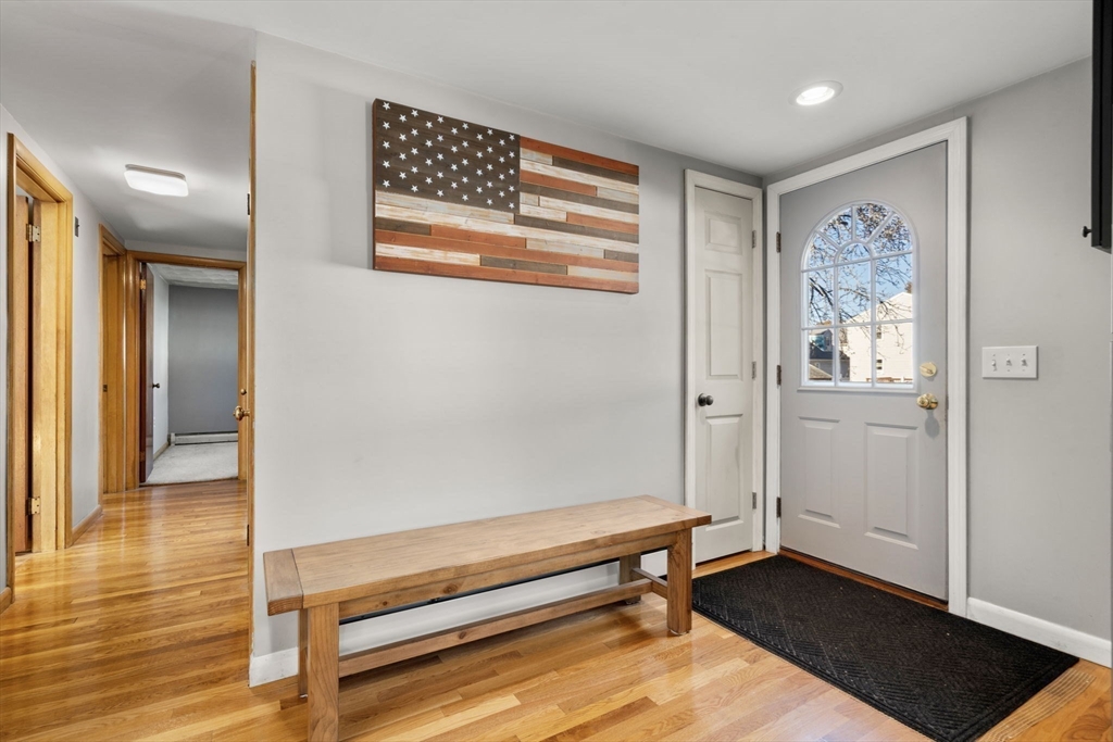 30 Wampum Avenue Waltham, MA 02451 - Photo 8 of 29 a view of room with window and wooden floor