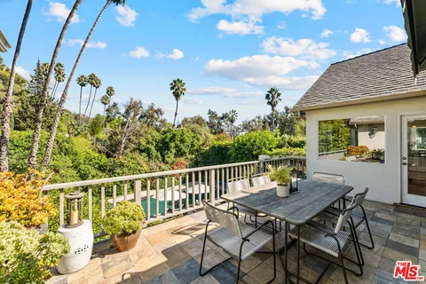 a view of a table and chairs in patio