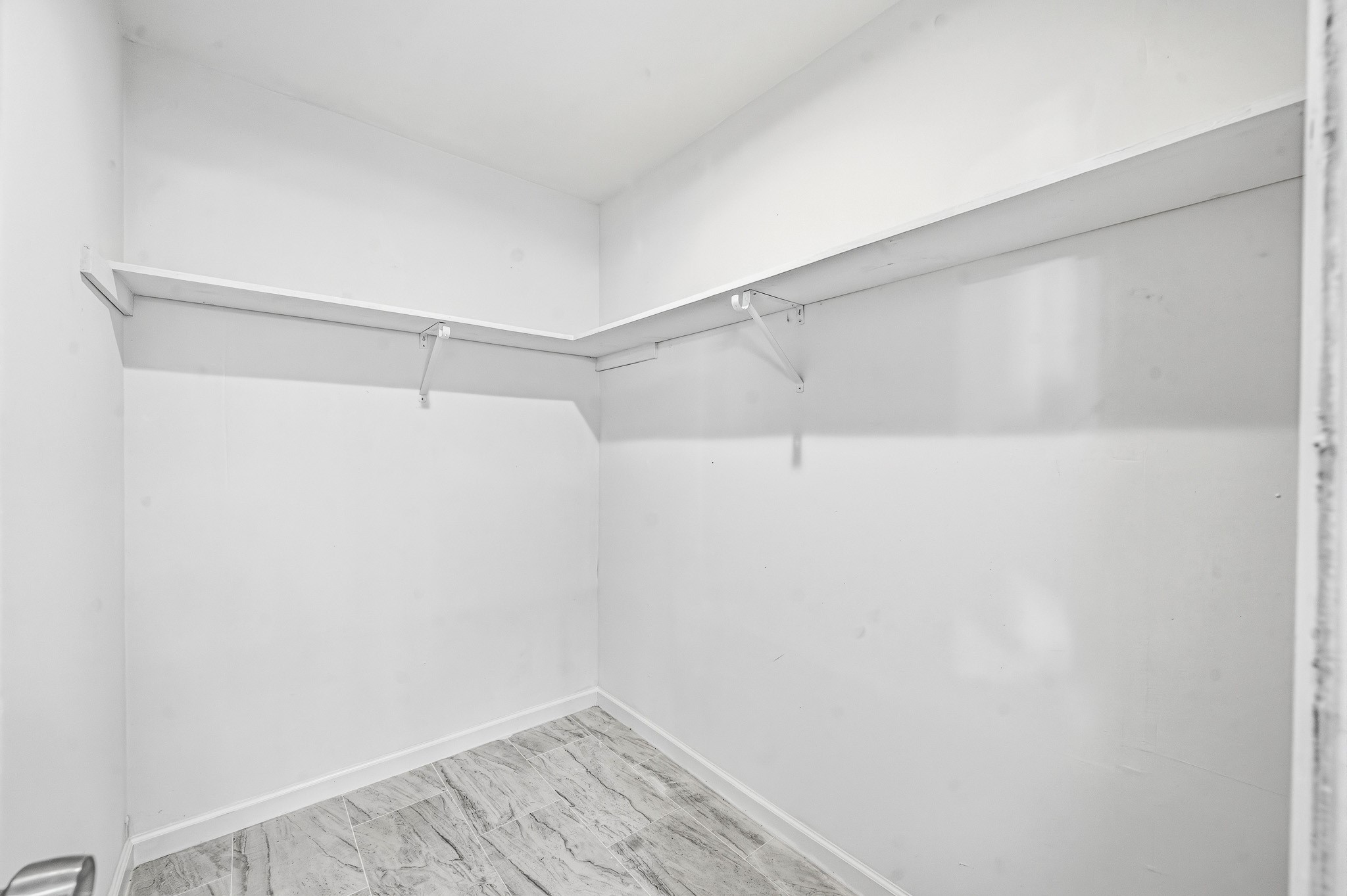 111 Princess Drive Houston, TX 77034 - Photo 22 of 30 a view of a room with shelf on the wall
