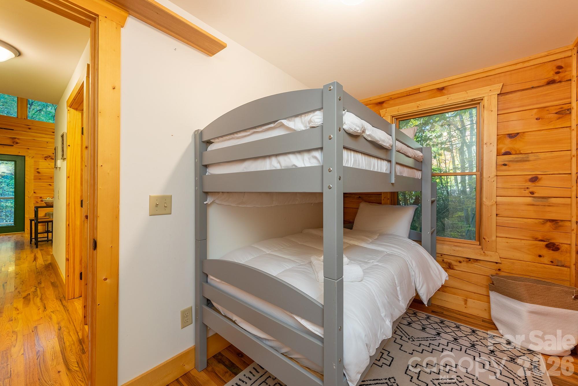 100 Candlemaker Trail Maggie Valley, NC 28751 - Photo 18 of 34 a bedroom with a bed and a window