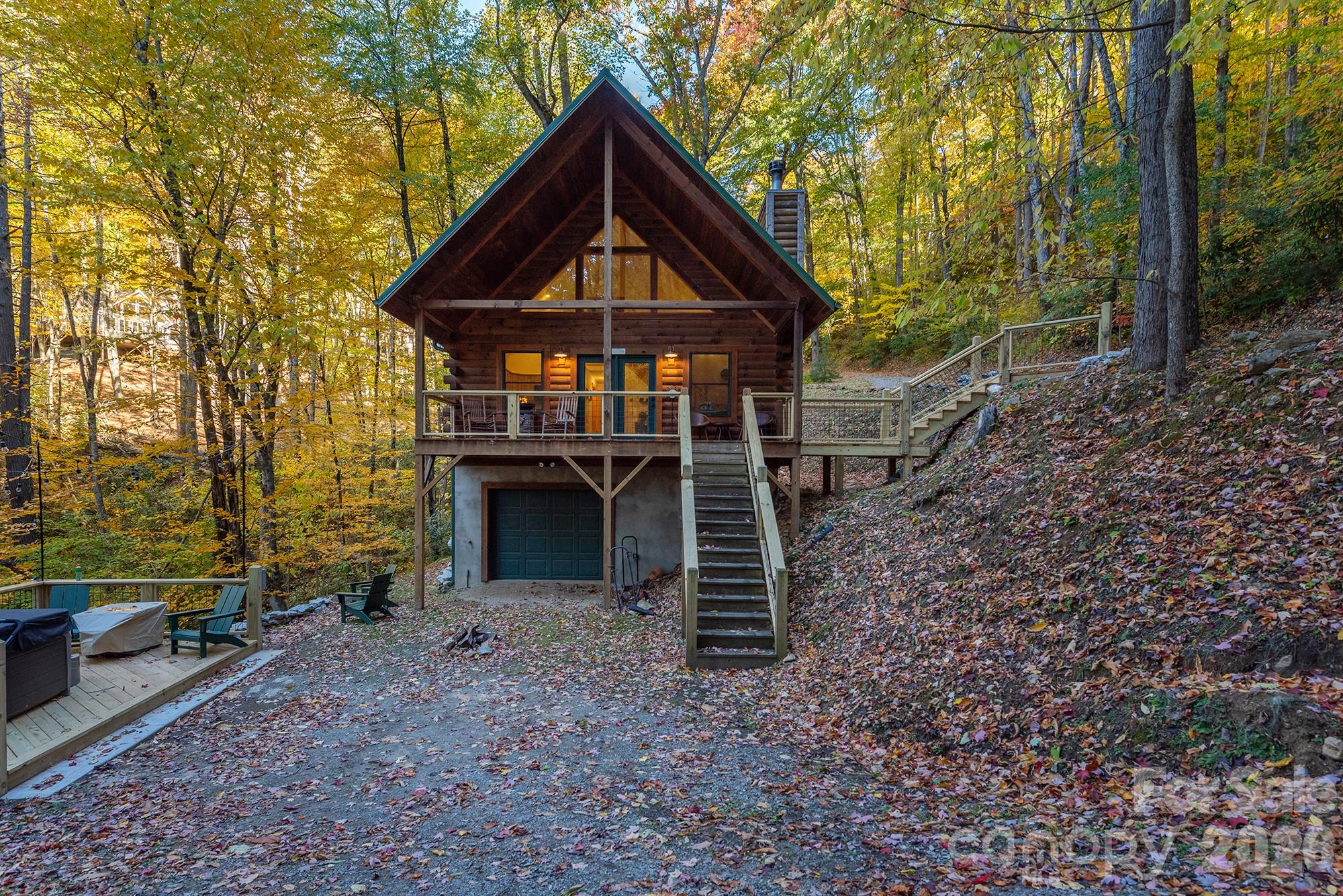 100 Candlemaker Trail Maggie Valley, NC 28751 - Photo 30 of 34 a front view of a house with a yard