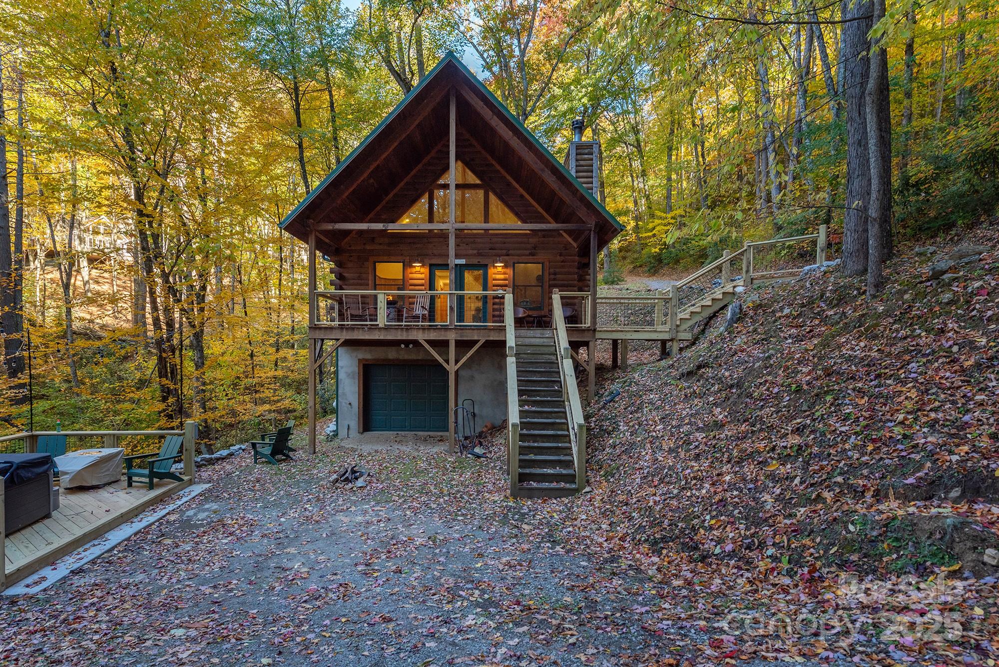 100 Candlemaker Trail Maggie Valley, NC 28751 - Photo 30 of 34 a front view of a house with a yard
