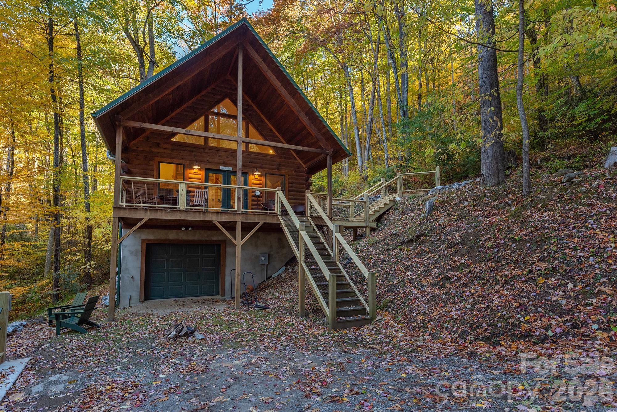 100 Candlemaker Trail Maggie Valley, NC 28751 - Photo 34 of 34 a view of a house with a yard