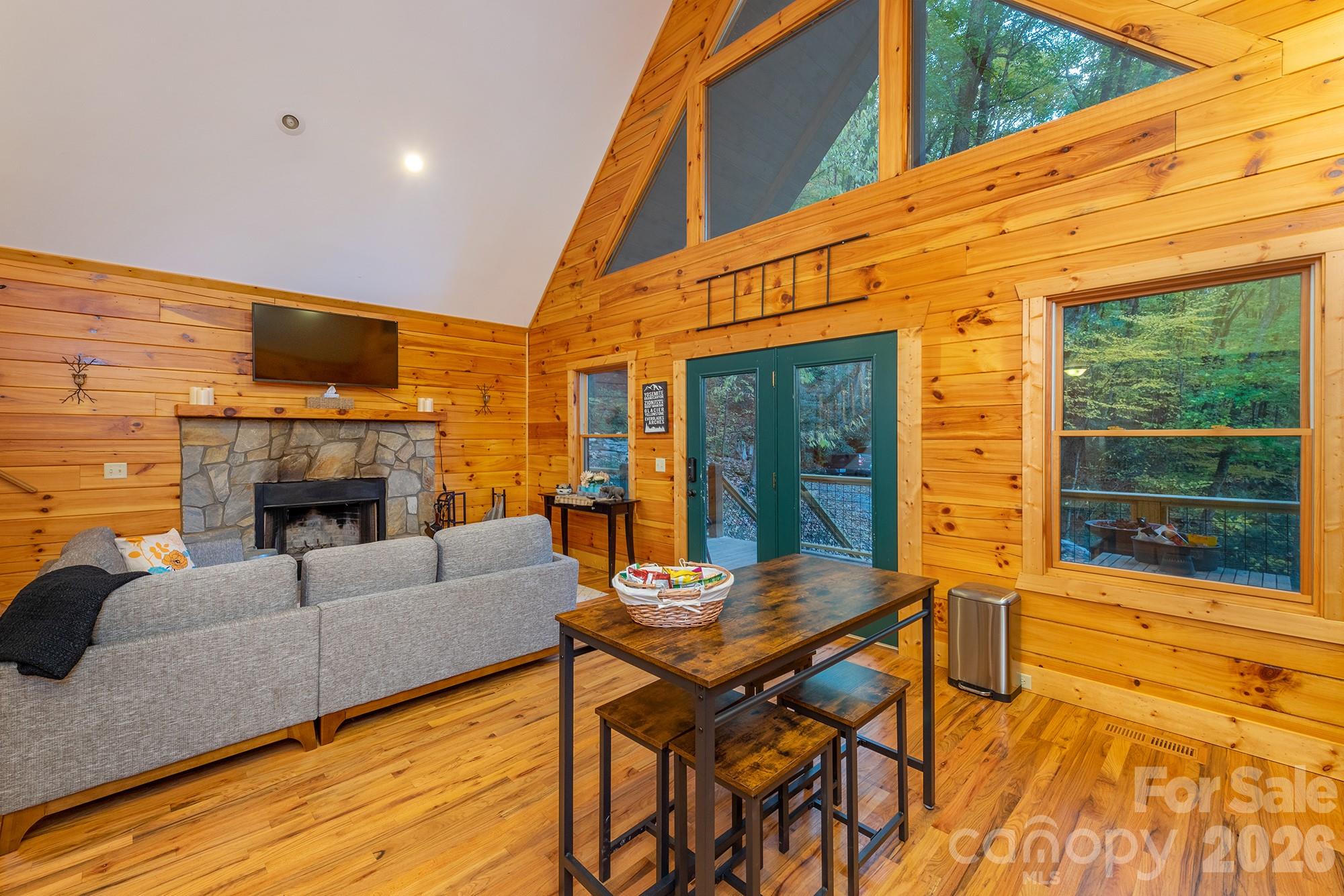 100 Candlemaker Trail Maggie Valley, NC 28751 - Photo 6 of 34 a view of a patio with a table and chairs