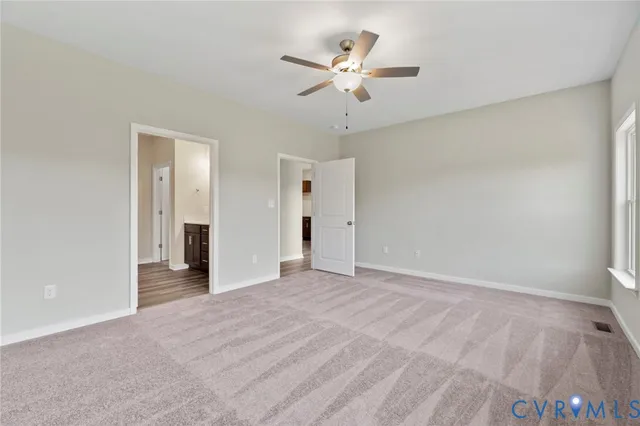 a bathroom with a double vanity sink and mirror