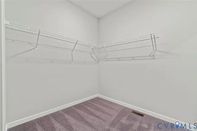 a view of room with hardwood floor