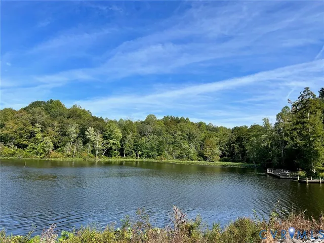 a view of a lake with a city