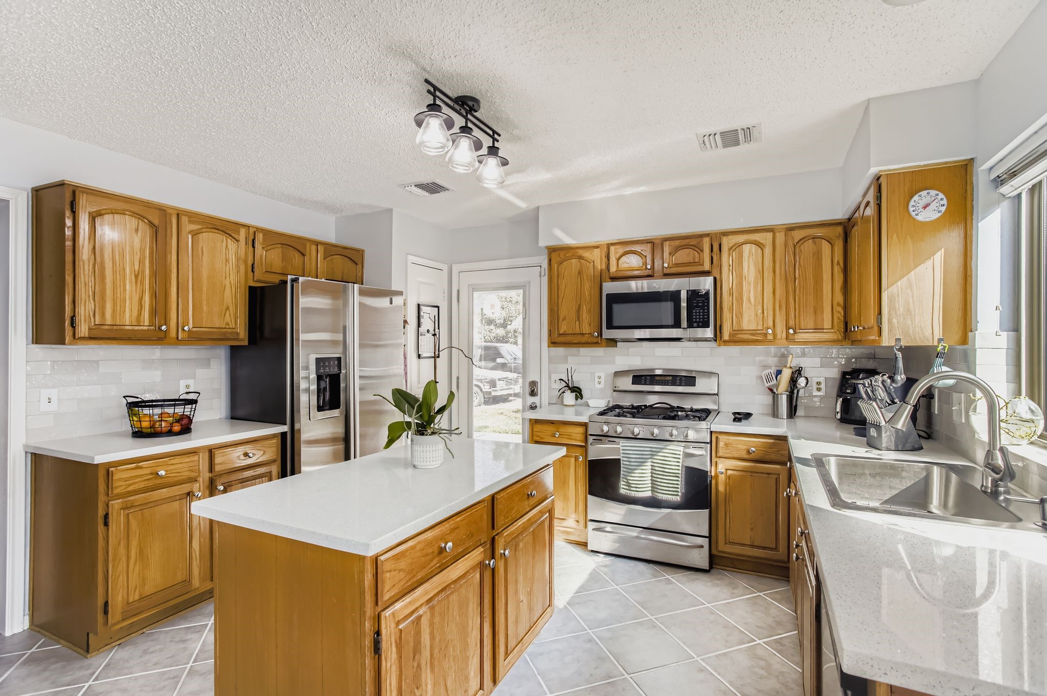 7530 Dogwood Falls Road Houston, TX 77095 - Photo 14 of 27 This kitchen offers a ton of cabinet & counter space, and the natural light pours in.