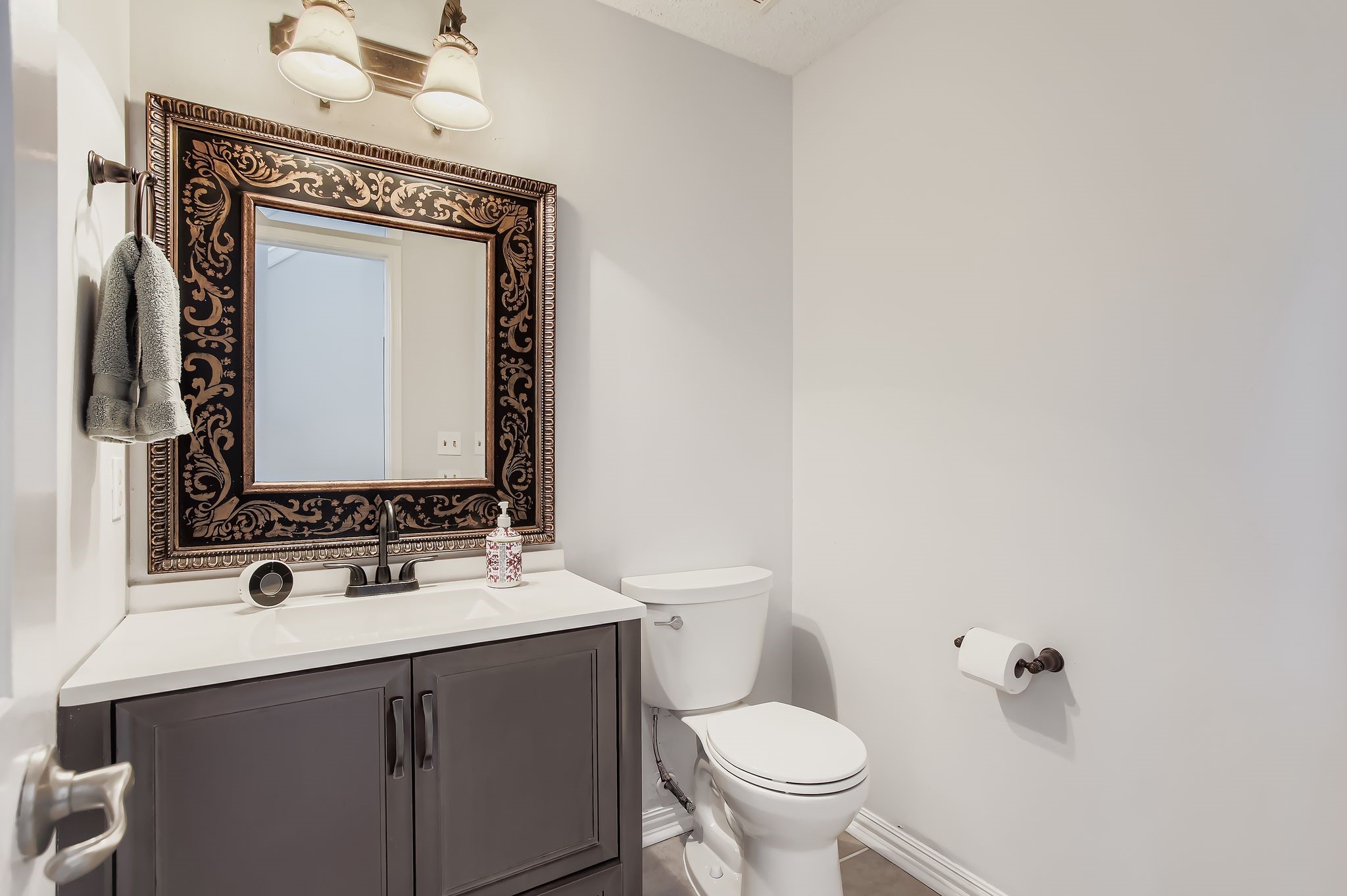 7530 Dogwood Falls Road Houston, TX 77095 - Photo 16 of 27 Nicely update half bath in the entry hall for your guests.