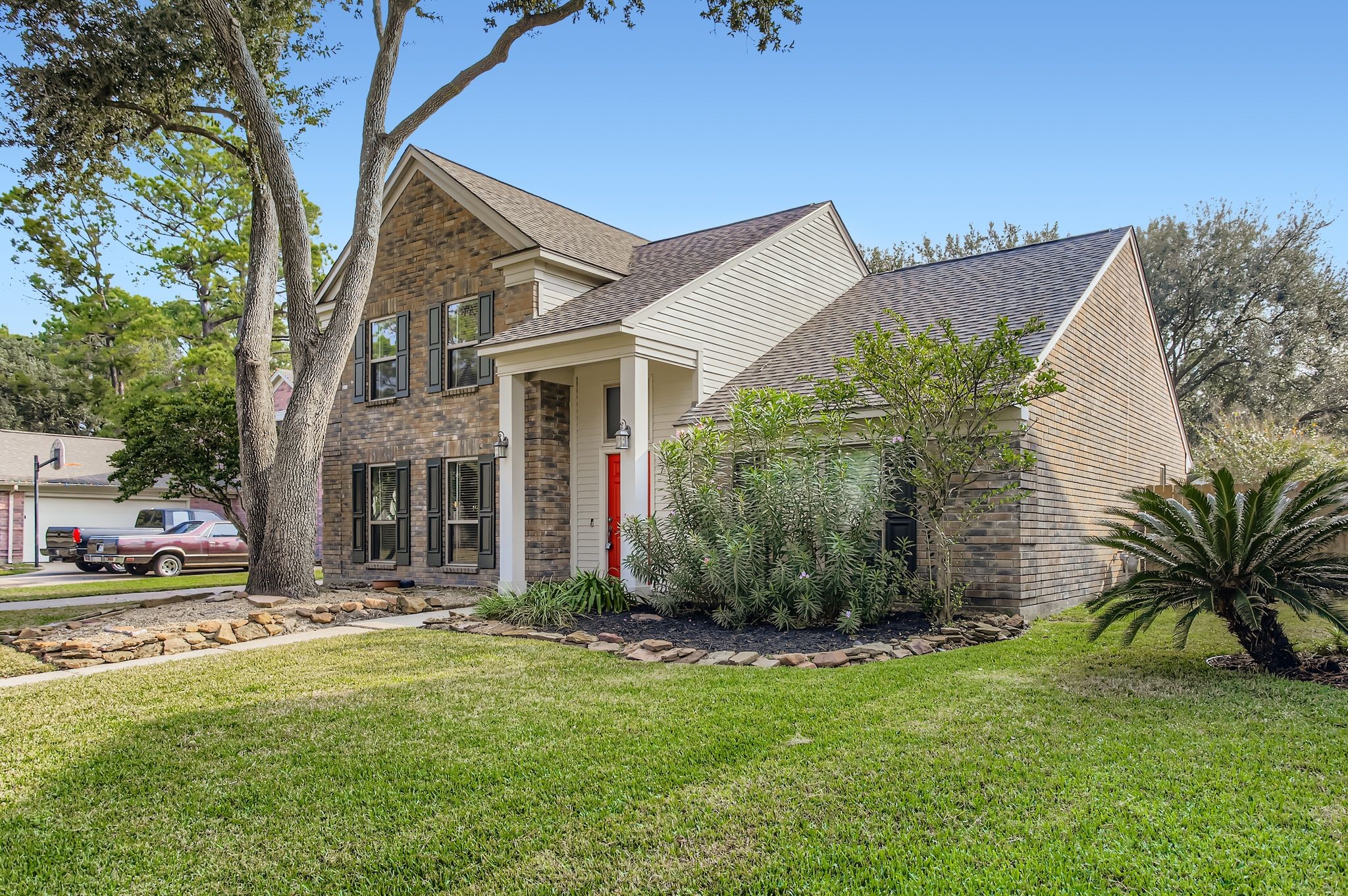 7530 Dogwood Falls Road Houston, TX 77095 - Photo 2 of 27 This home has a stunning brick elevation offering instant curb appeal.
