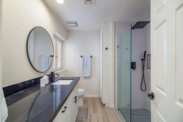 a living room with a couch and a flat screen tv