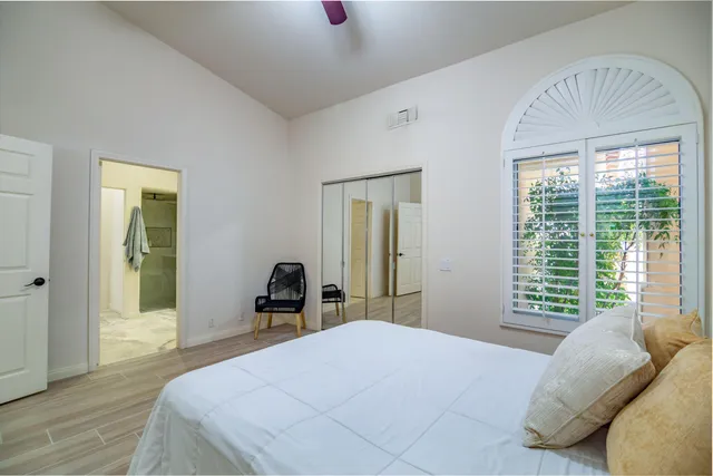 a kitchen with a stove and a large window