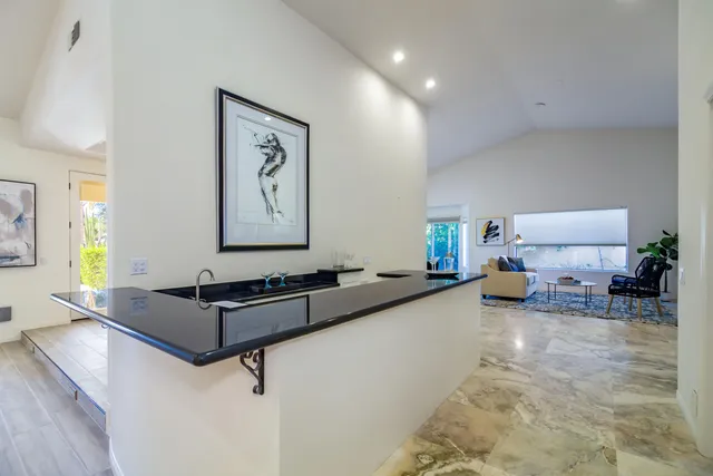 a outdoor living space with furniture and a potted plant