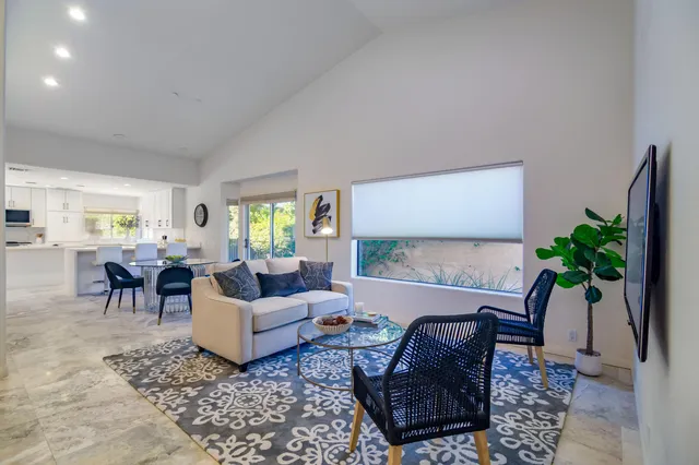 a view of a park with a bench in front of it