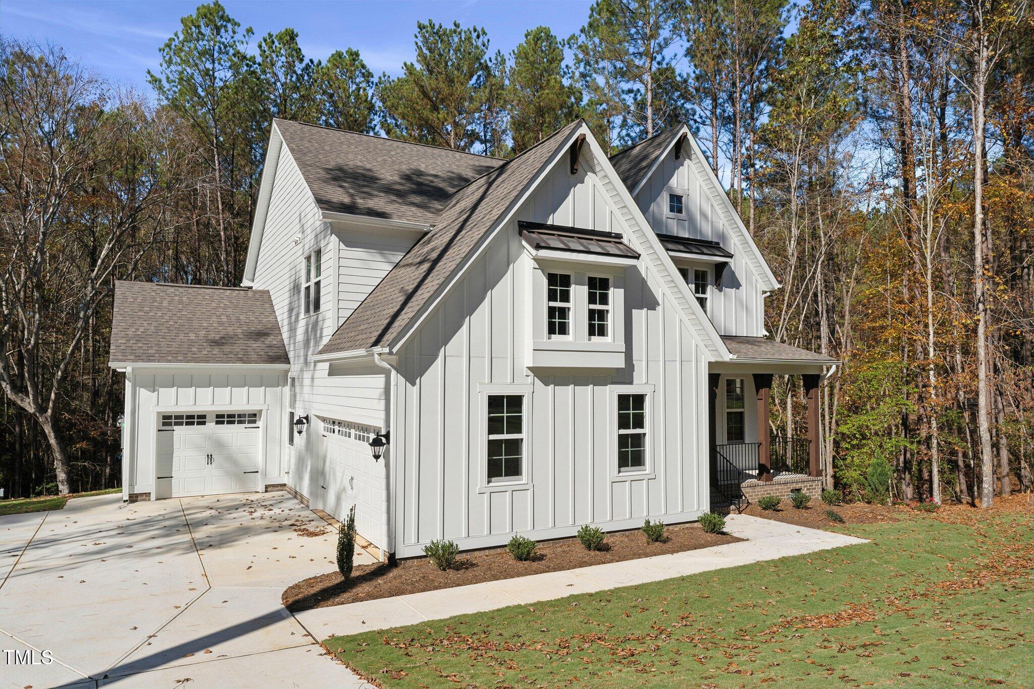 237 Dona Drive Carthage, NC 28327 - Photo 2 of 39 a front view of a house with a yard