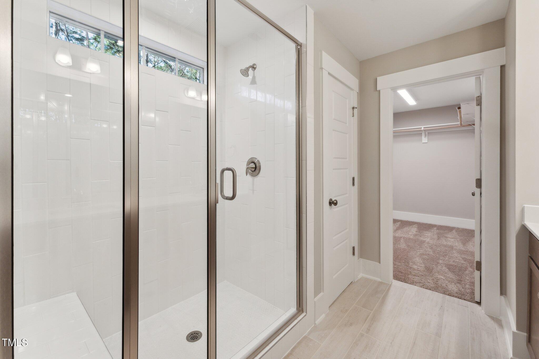 237 Dona Drive Carthage, NC 28327 - Photo 31 of 39 a bathroom with a glass shower door